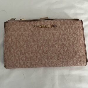 Classic Michael Kors wallet. One time use.
